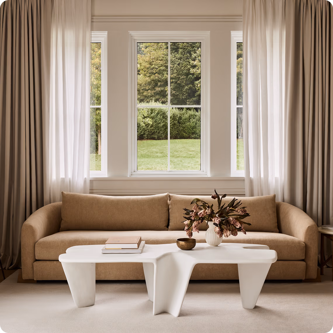 Modern lounge featuring electric blinds in Dubai.