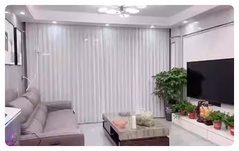 long motorized blinds in TV Lounge
