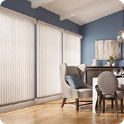 Cream vertical blinds blue wall