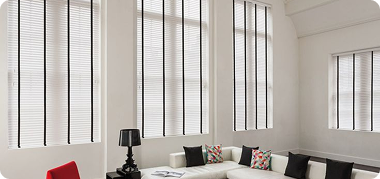 Stylish white Venetial Blinds in Dubai lounge.