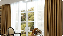 Brown & White elegant motorized Curtains in Dubai